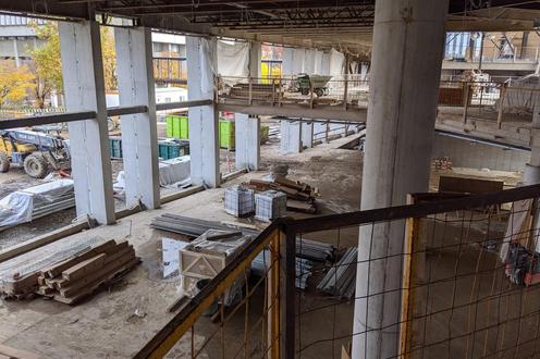 A view of the construction from the second floor looking down towards the space that will be the new main social lounge.