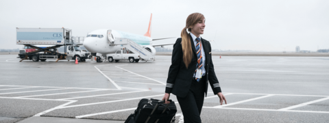 Pilot walking on a tarmac