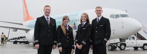 Cameron Fuchs, Spencer Leckie, Siobhan O’Hanlon, and Chelsea Anne Edwards - recent graduates of the Aviation program and first officers for Sunwing Airlines.