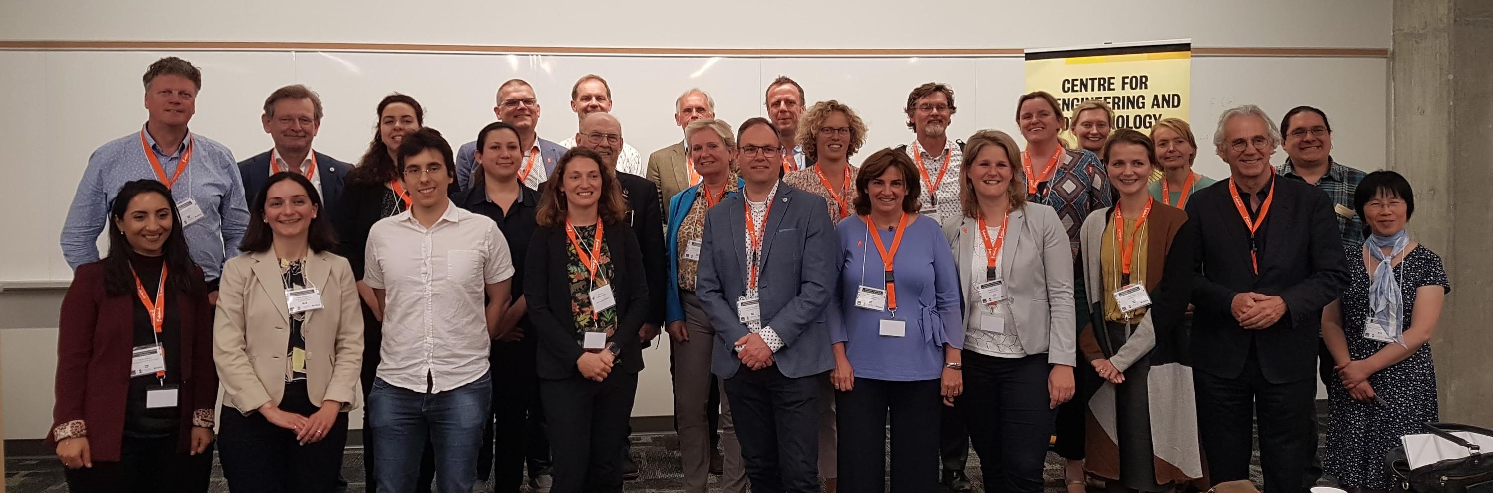 Group photo of visitors from the Netherlands and UW symposium speakers