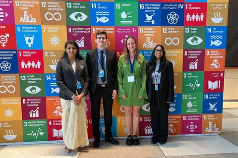 UW Ph.D. students Navya .V. Nair, Kevin B. White, Isabel Jorgensen, and Harshina Brijlall at UN Water Conference