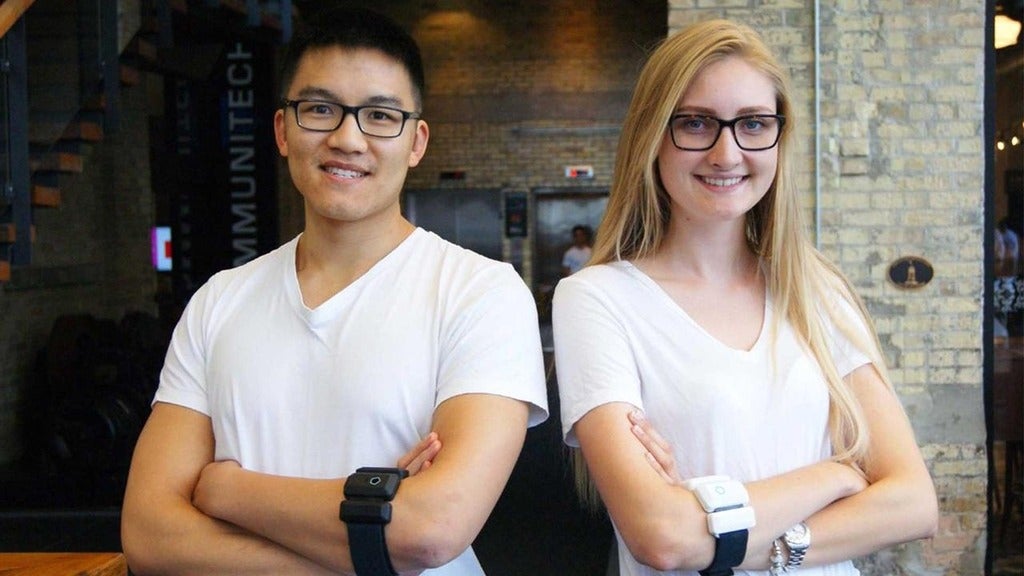 Daniel Choi and Alexa Roeper wear their medical arm bands