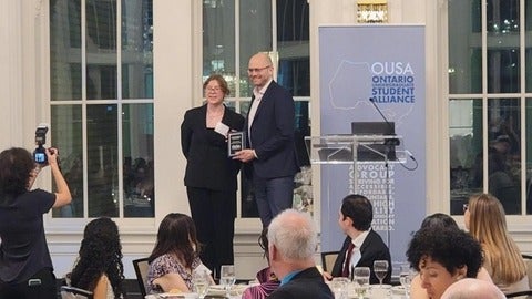 Josh D. Neufeld for receiving OUSA’s Teaching Excellence Award