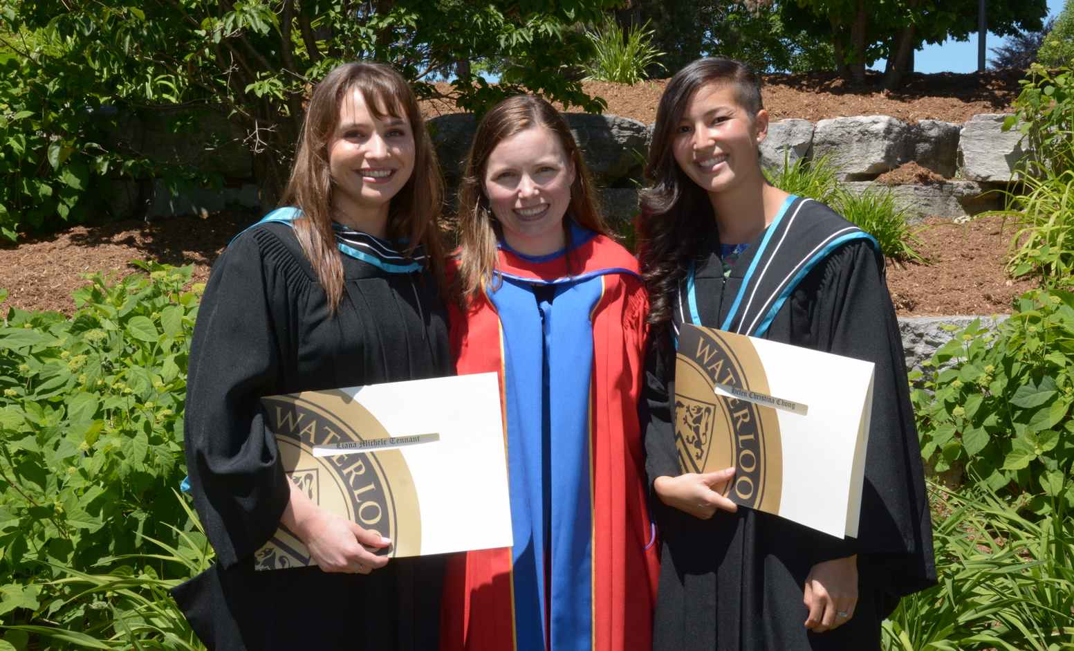 Helen Chong, Liana Tennant, and Stacey Acker in ceremonial robes