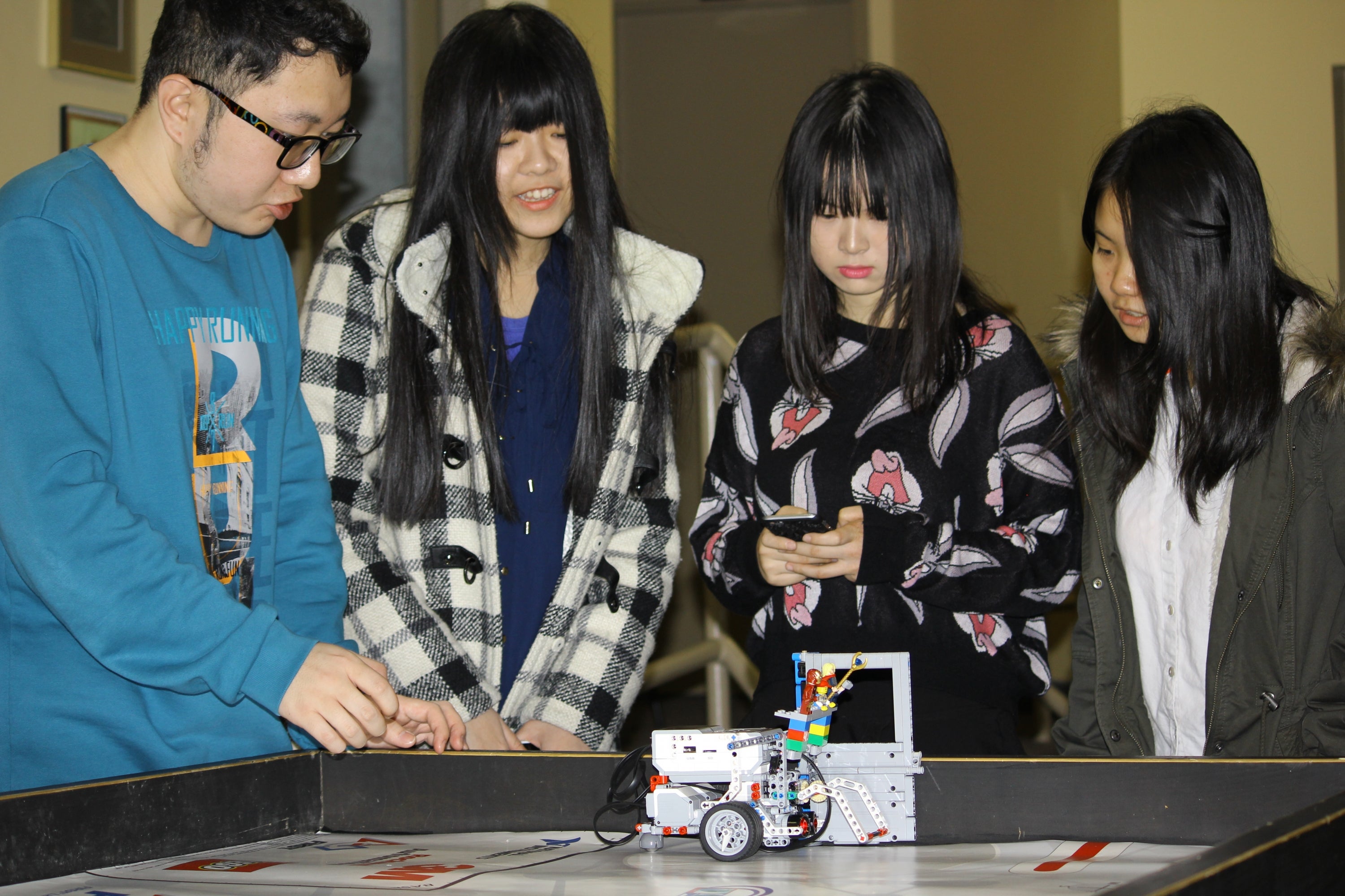 Students participating in a LEGO Robotics challenge