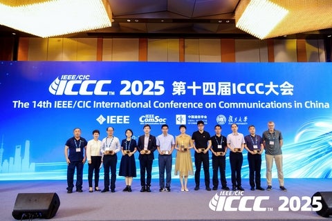 Prof. Shen presented the IEEE Fellow Award to the newly elevated IEEE Fellows