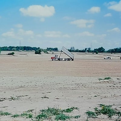 view of a barren landscape as the new football fields are made, 1993