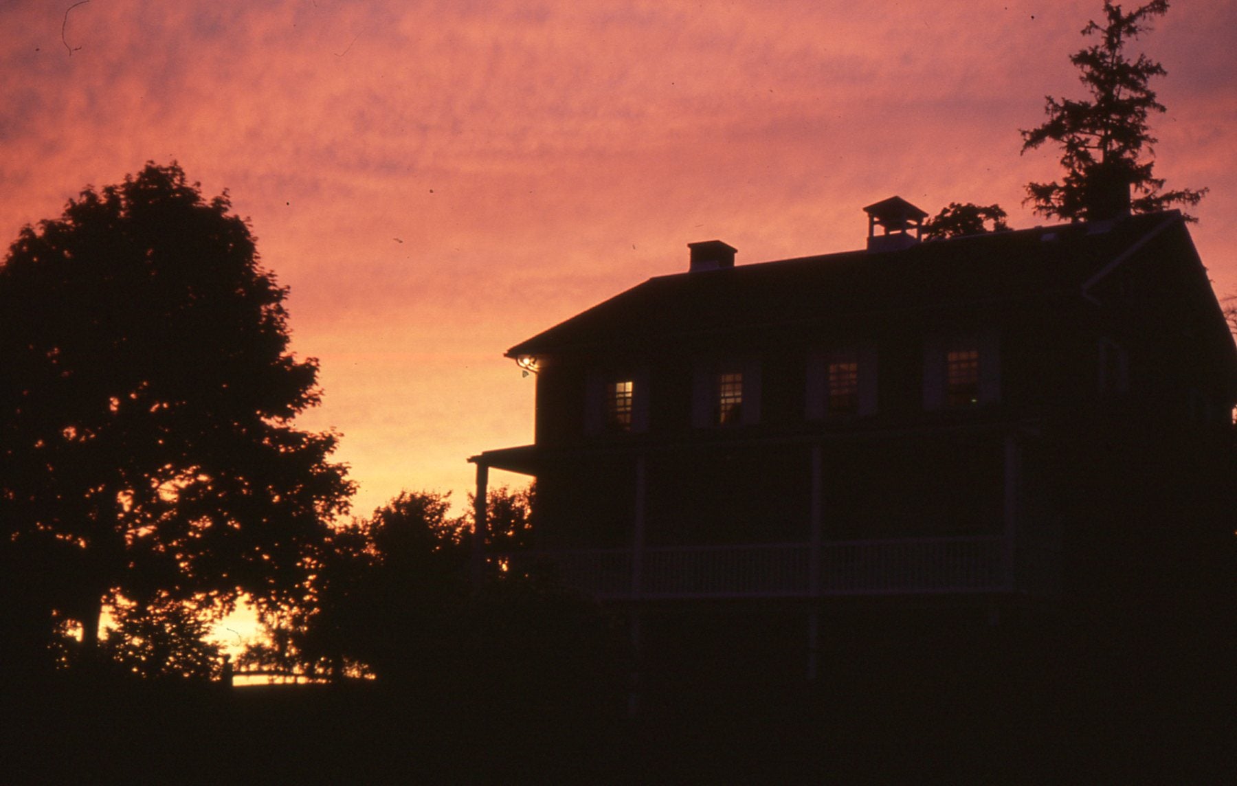 sunset in pinks and yellows, brubacher house in silhoette