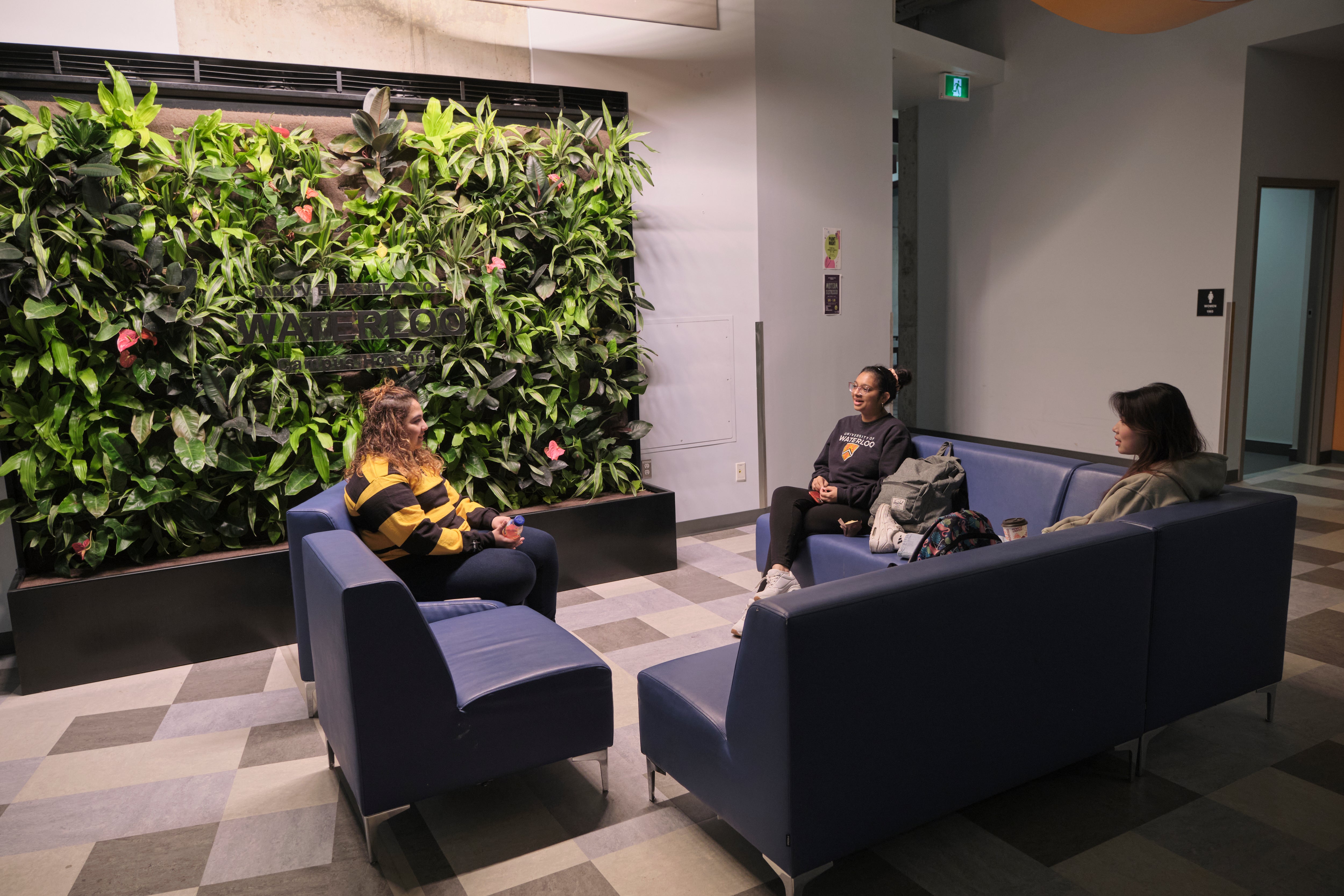 Claudette Millar Hall main floor seating area and plant wall
