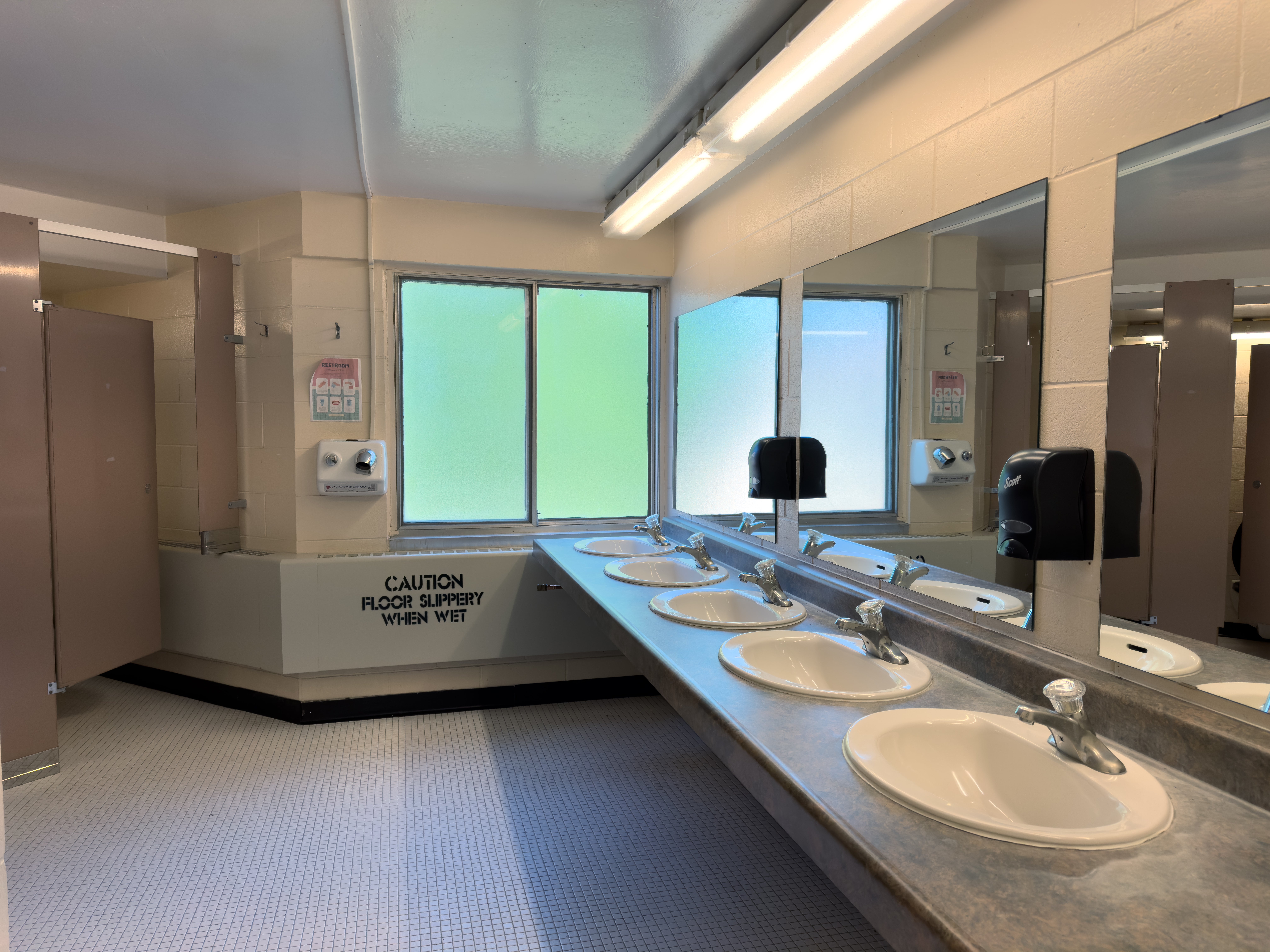 Ron Eydt Village washroom showing sinks and toilet stalls