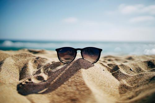 Sun glasses in sand