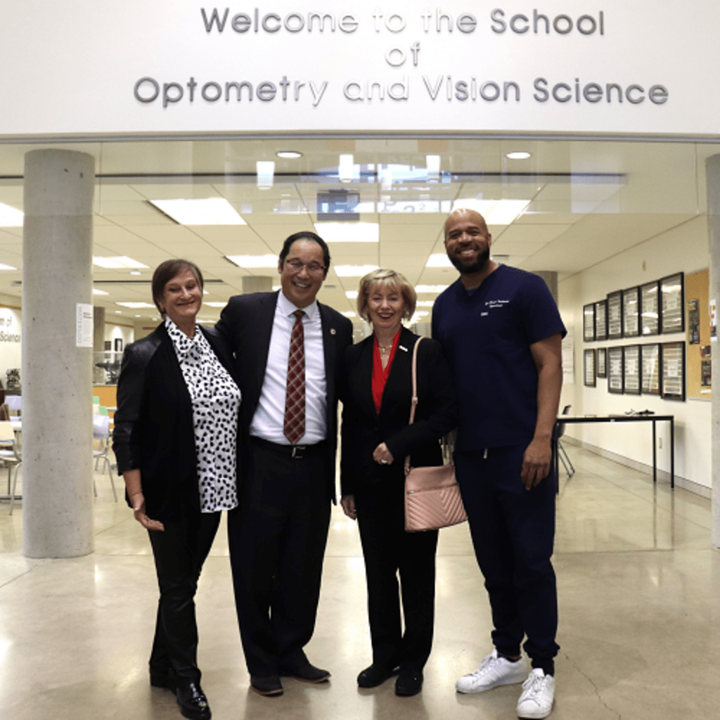 Marta Witer, Stan Woo, Judy Sgro, and Andre Stanberry stand together at the School