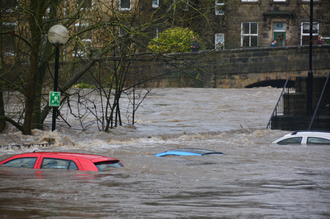 vehicles underwater on an urban street