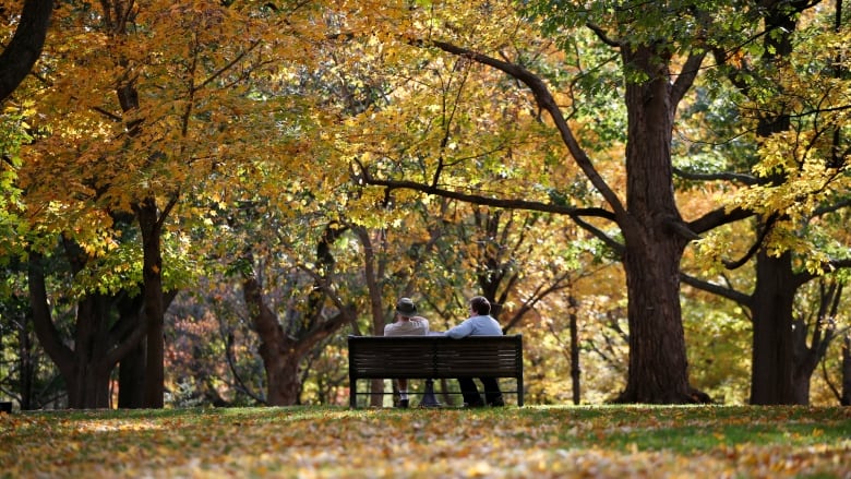 A couple in Ottawa enjoying a warm autumn day. Research shows getting out to enjoy nature is one way to increase your feeling of well-being during the Thanksgiving lockdown. 