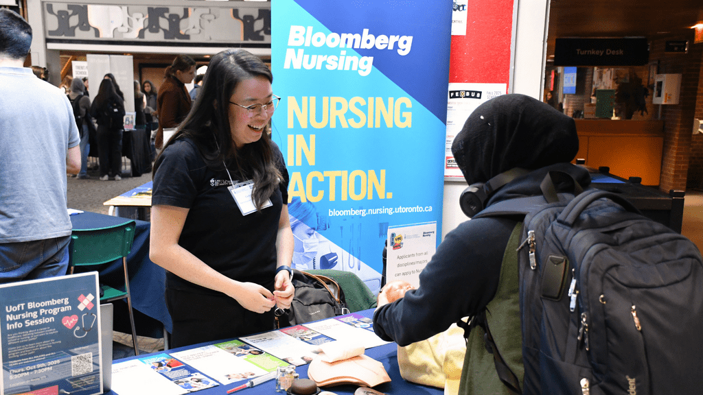 two people talking at a table 