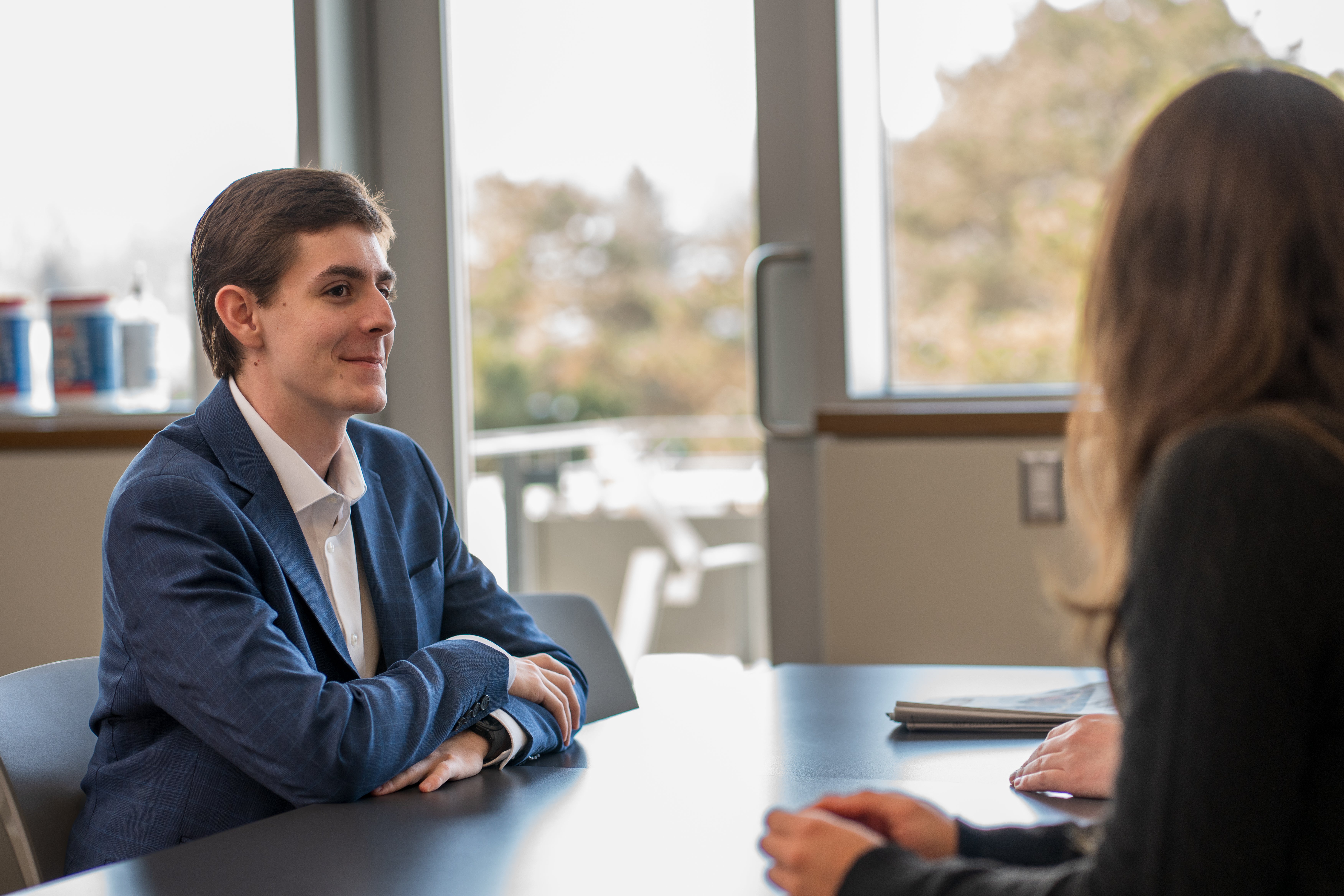 man sitting at table