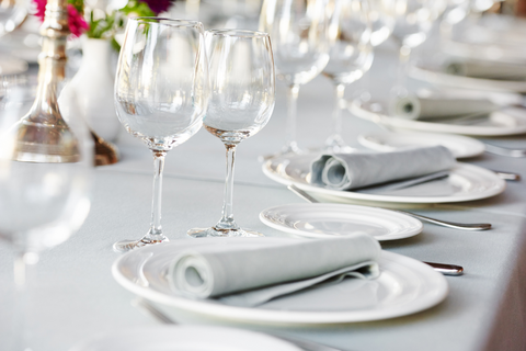 refined white table decor and dinnerware