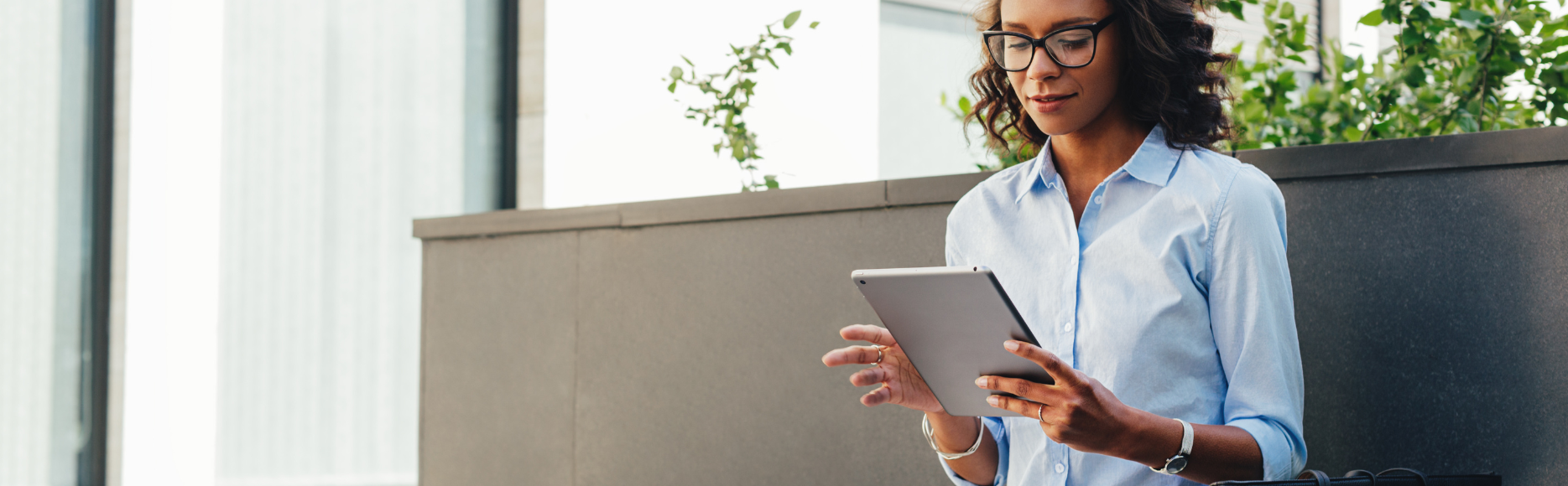 Woman ordering catering on tablet