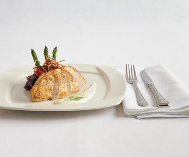 Pan-seared Sargent Farms chicken breast with seasonal vegetables