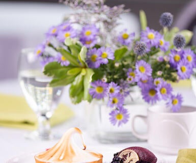 Lemon meringue tart with black berry sorbet