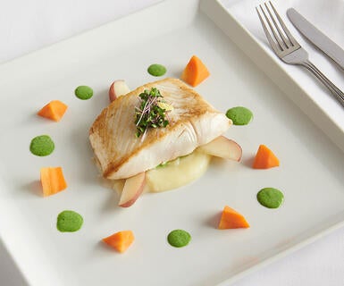 Halibut with spring pea puree and whipped potatoes