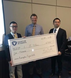 Picture of Johnny Li (team member) and Kenneth Zhou won the Redington Prize from the Investment Section of the Society of Actuaries in 2019