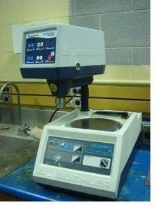 A Ecomet 3 variable speed grinder-polisher