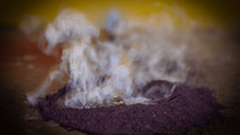 Purple powder and smoke.