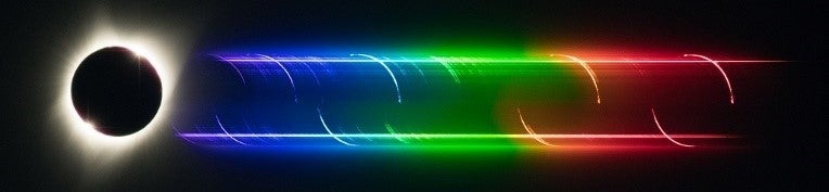 a hydrogen atomic emission lines imaged from the sun’s chromosphere during a eclipse – there is an eclipse sun with a tube with all the rainbow of colour starting from purple to red