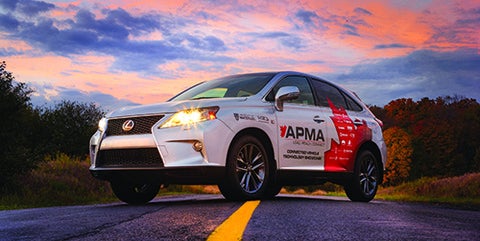 APMA connected car parked on road at sunrise