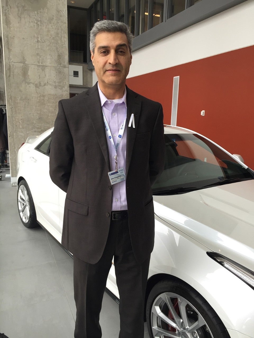 Amir Khajepour standing infront of Waterloo's newest donated Honda