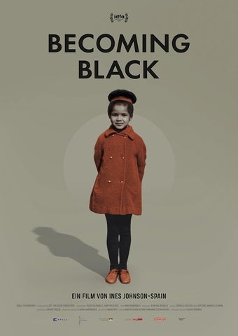 Movie poster: Black girl wearing rust-coloured pea coat and matching shoes.