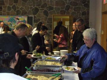 Attendees getting food