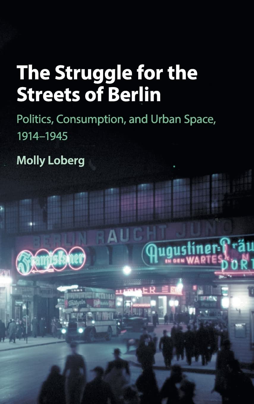 City at night with people walking book cover