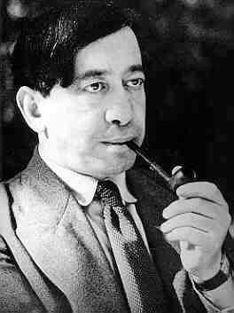 Black-and-white headshot of author Siegfried Krakauer smoking his pipe.