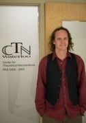 Chris Eliasmith standing in front of CTN Centre door