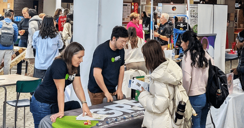 Students speaking to organizations at 2025 volunteer fair