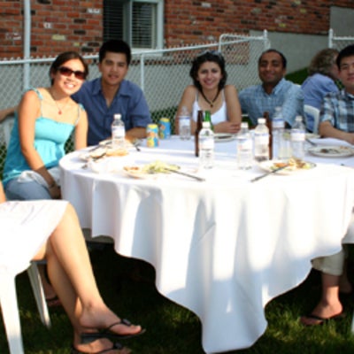Several attendees at the table during BBQ 2005