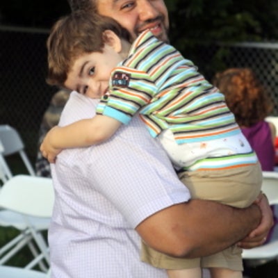 Maher Bakri Kasem with his child at BBQ 2010
