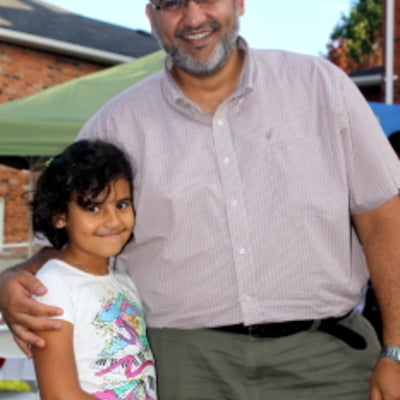 A male attendee with his daughter at BBQ 2010