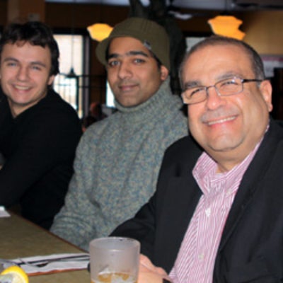 Dr. Raafat Mansour, Nino Zahirovic, and Neil Sarkar at Christmas lunch 2009
