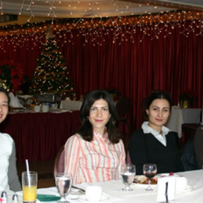 Four female attendees at the Christmas lunch 2005