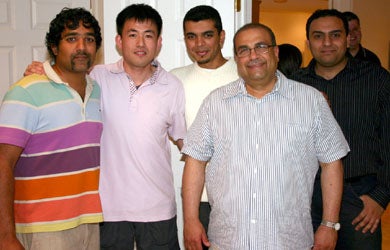 Dr. Raafat Mansour and other male attendees at BBQ 2008
