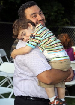 Maher Bakri Kasem with his child at BBQ 2010