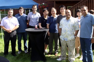 Dr. Raafat Mansour with some male attendees at BBQ 2010
