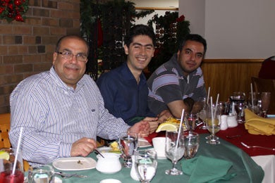 Dr. Raafat Mansour, Mostafa Azizi, and Saman Naziramadi at Christmas lunch 2010