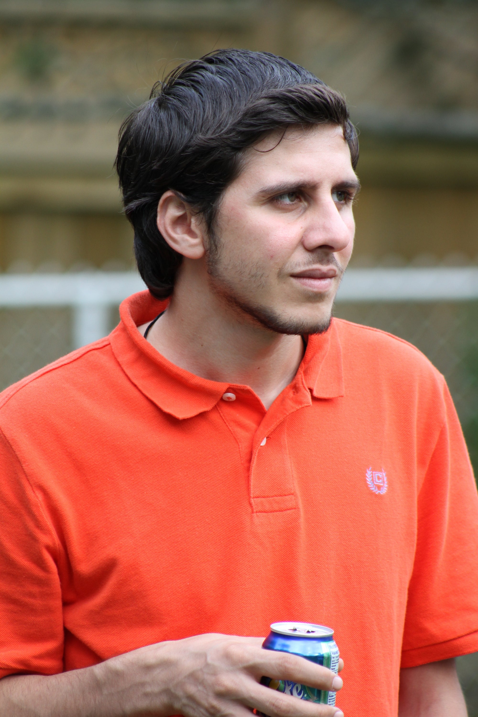 Marco in orange shirt