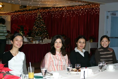 Four female attendees at the Christmas lunch 2005