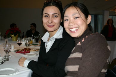 Two female attendees at the Christmas lunch 2005