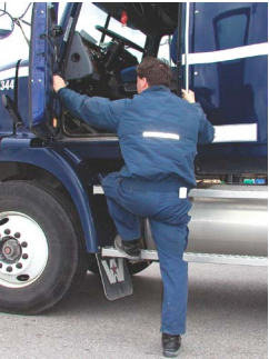 Truck driver entering a truck